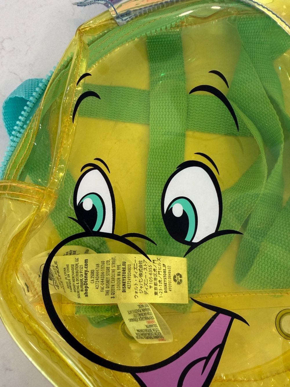 Disney Store Little Mermaid Flounder Translucent Backpack - Picture 2 of 6